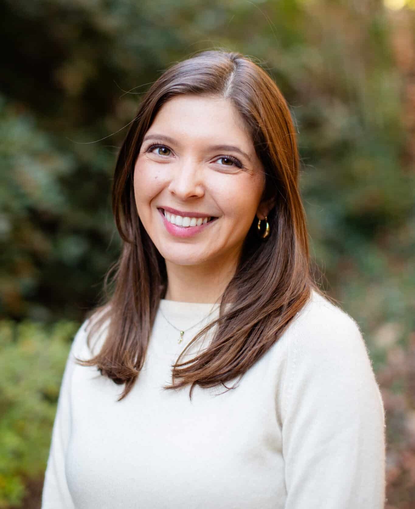 a woman smiling for the camera