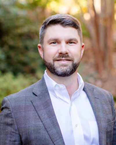 Jack Little Wearing A Suit And Tie